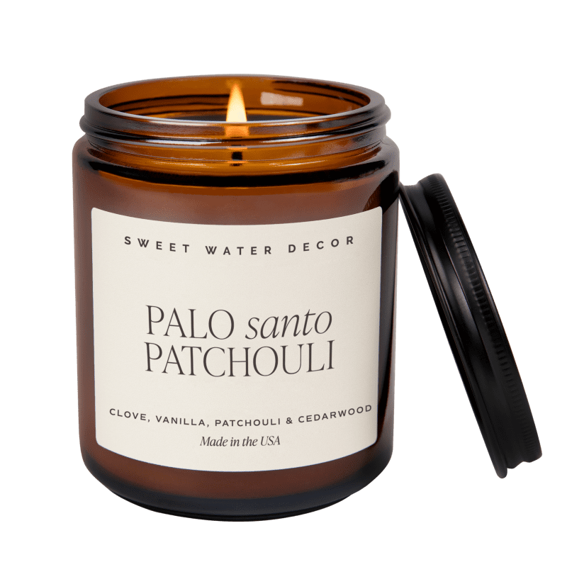 C141A PALO SANTO PATCHOULI 2023 AMBER CANDLE SWEET WATER DECOR WB