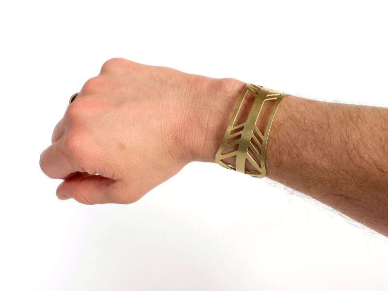 bridge of the gods cuff bracelet mans arm in brass by portland jewelry designer betsy iya